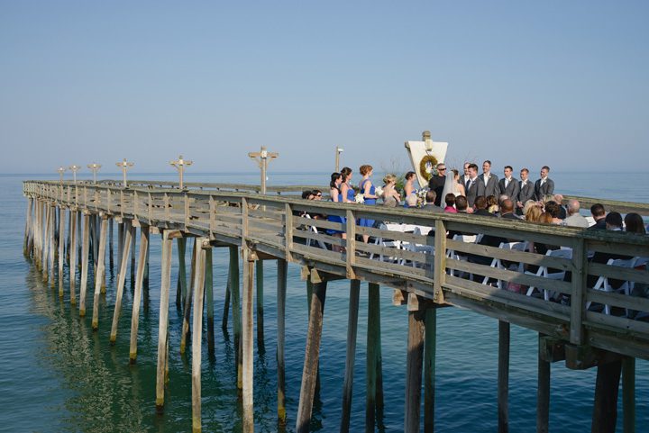 Kelly and Simon Outer Banks Wedding Pier Ceremony by Neil GT Photography