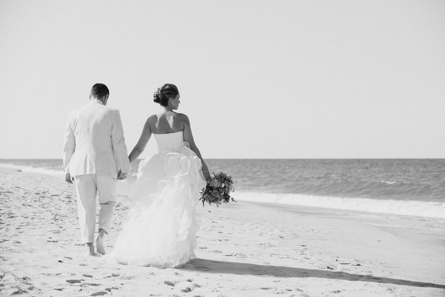 Jessica and Tom's Outer Banks wedding by Neil GT Photography Walking Away