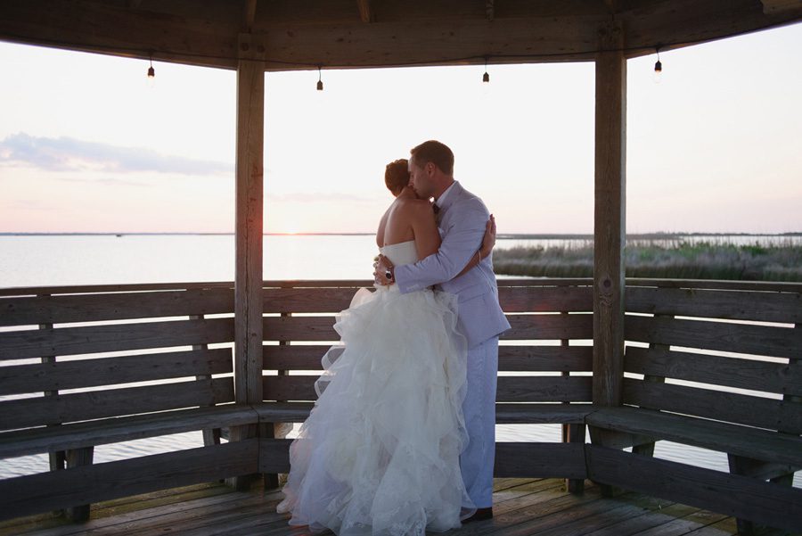 Jessica and Tom's Outer Banks wedding by Neil GT Photography Sunset Hug