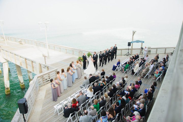 Michelle and Will Outer Banks wedding photographer Jennette's Pier ceremony aerial