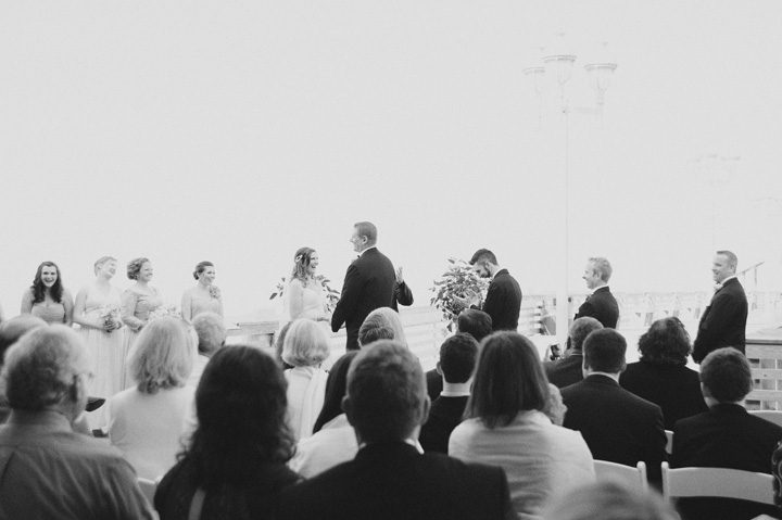 Michelle and Will Outer Banks wedding photographer Jennette's Pier ceremony bw