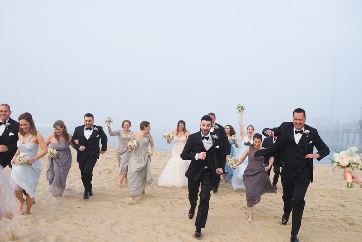 Michelle and Will Outer Banks wedding photographer Jennette's Pier run