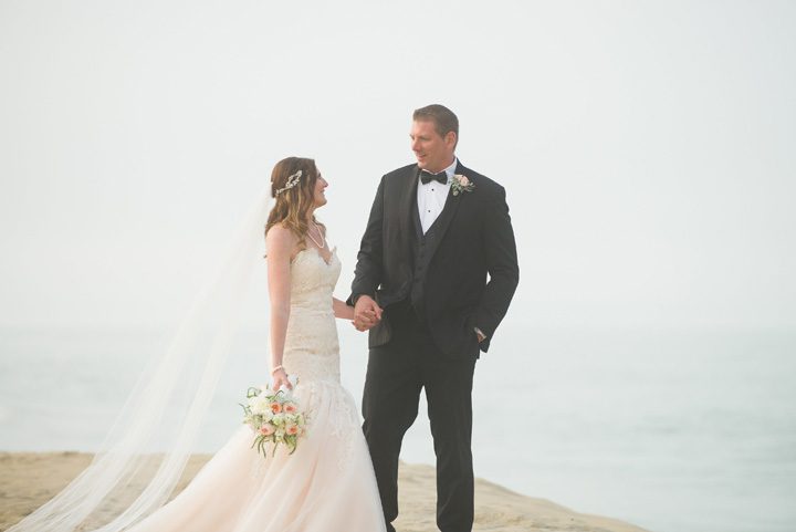Michelle and Will Outer Banks wedding photographer Jennette's Pier couple portrait