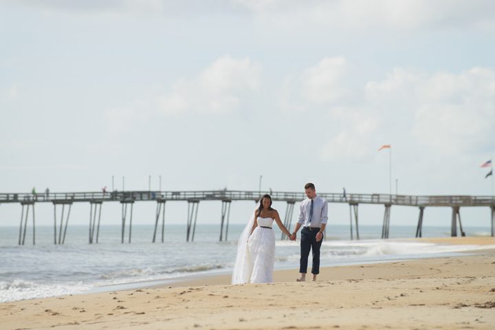 Morgan and Wesley Outer Banks Elopement Wedding by Neil GT Photography Walking Beach