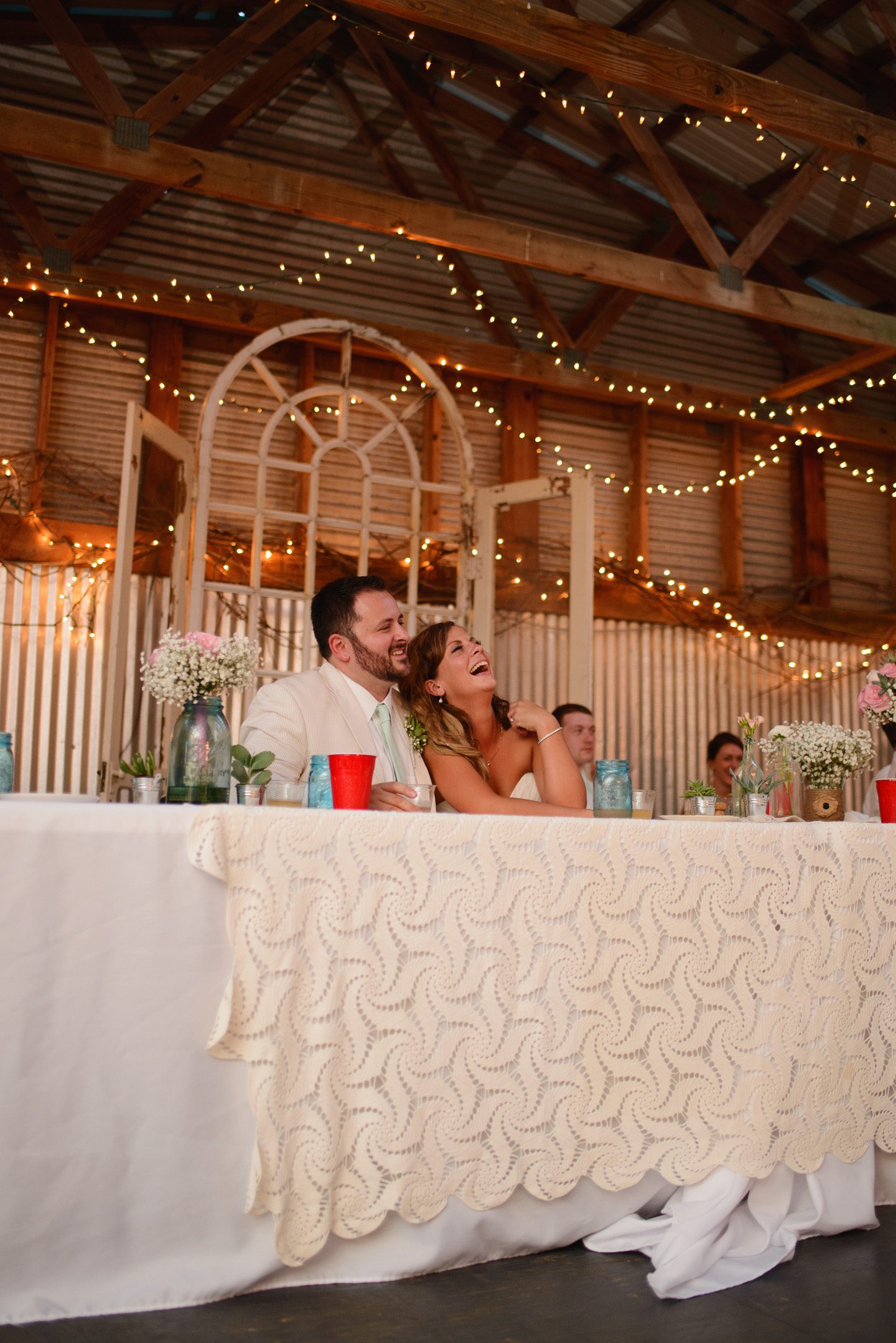 Kelly and Nathan by Neil GT Photography Sinkland Farms Christiansburg VA Wedding Toast Laughing