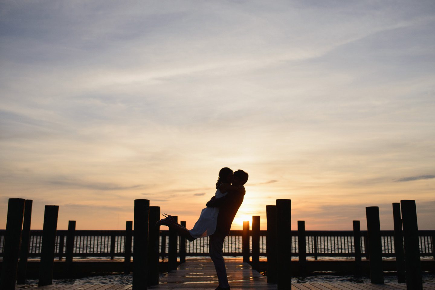 Sanderling Resort Outer Banks Wedding by Neil GT Photography Sunset Hug