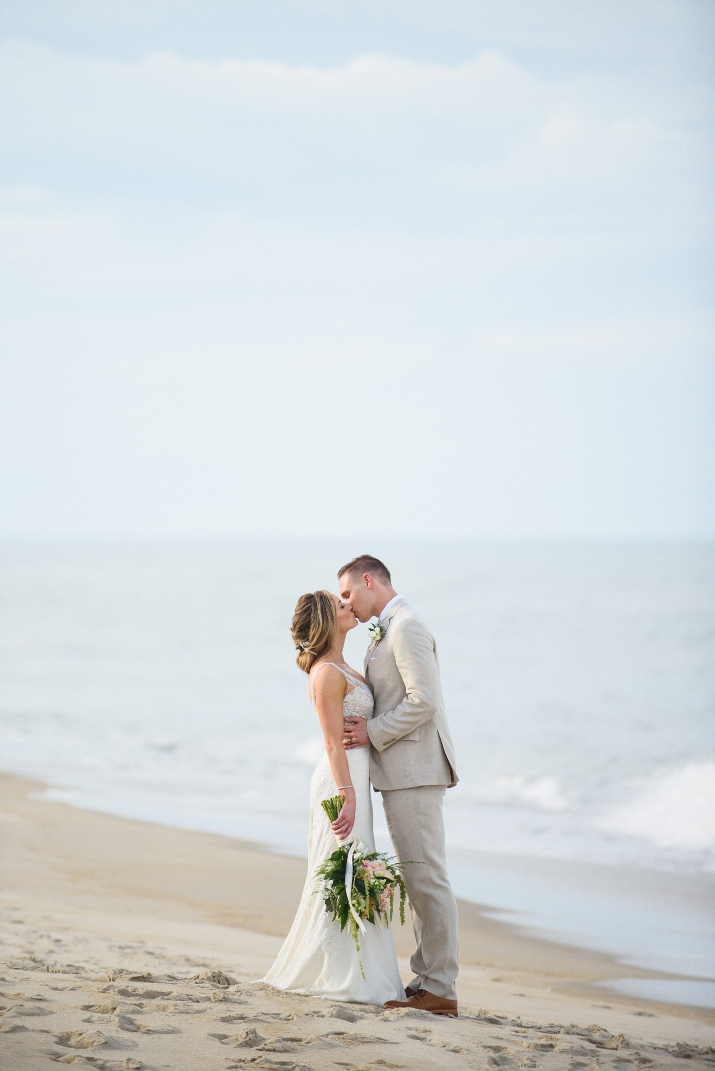 Outer Banks Wedding Photographers Neil GT Photography Palmers Island Beach Elopement Walking Beach Kiss
