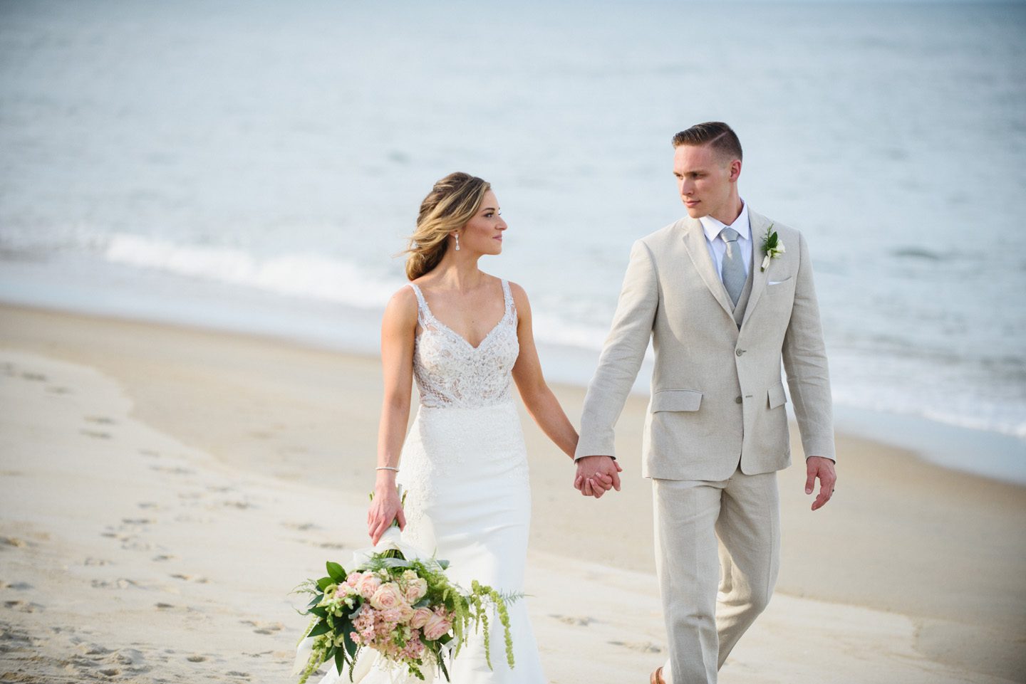 Outer Banks Wedding Photographers Neil GT Photography Palmers Island Beach Elopement Walking Beach Holding Hands