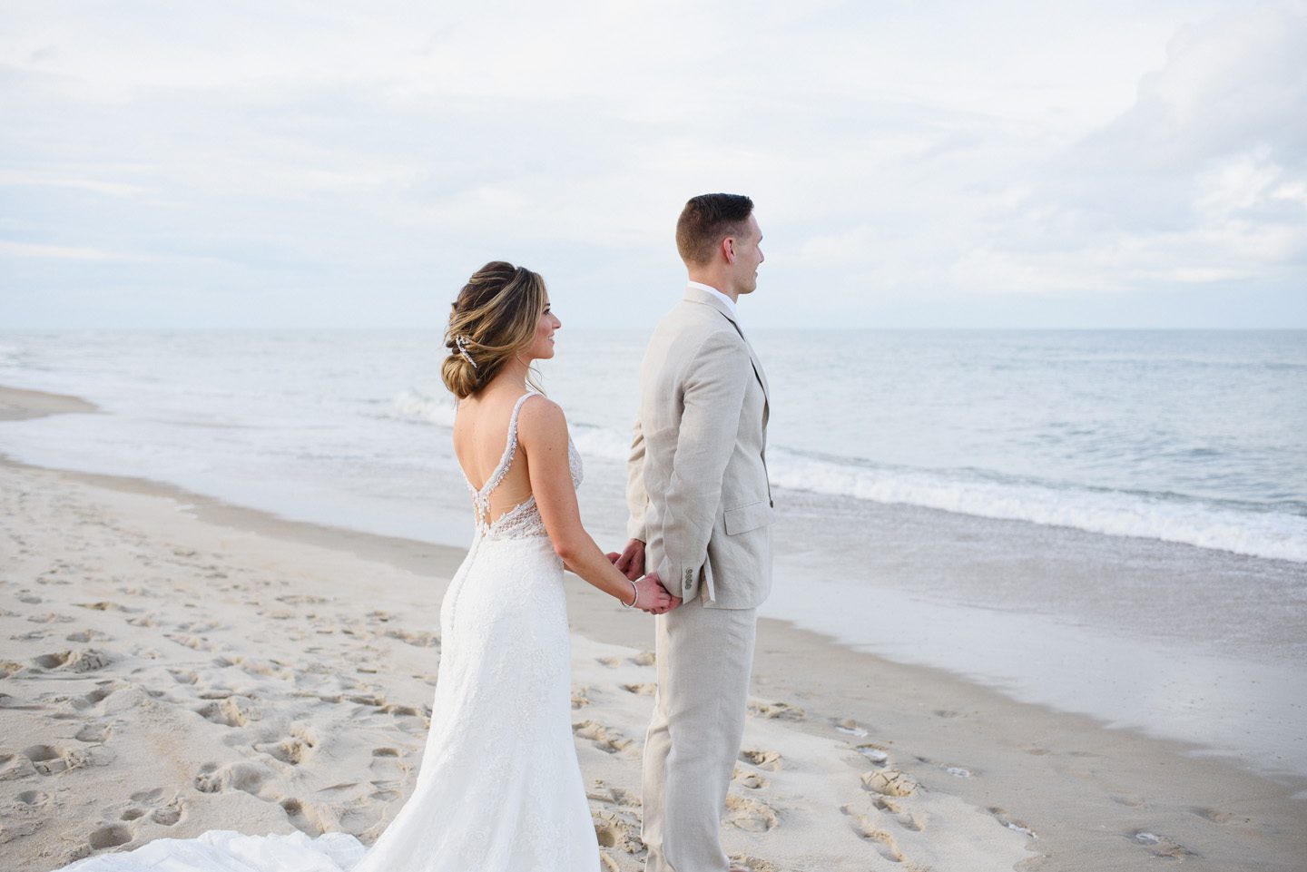 Outer Banks Wedding Photographers Neil GT Photography Palmers Island Beach Elopement Holding Hands