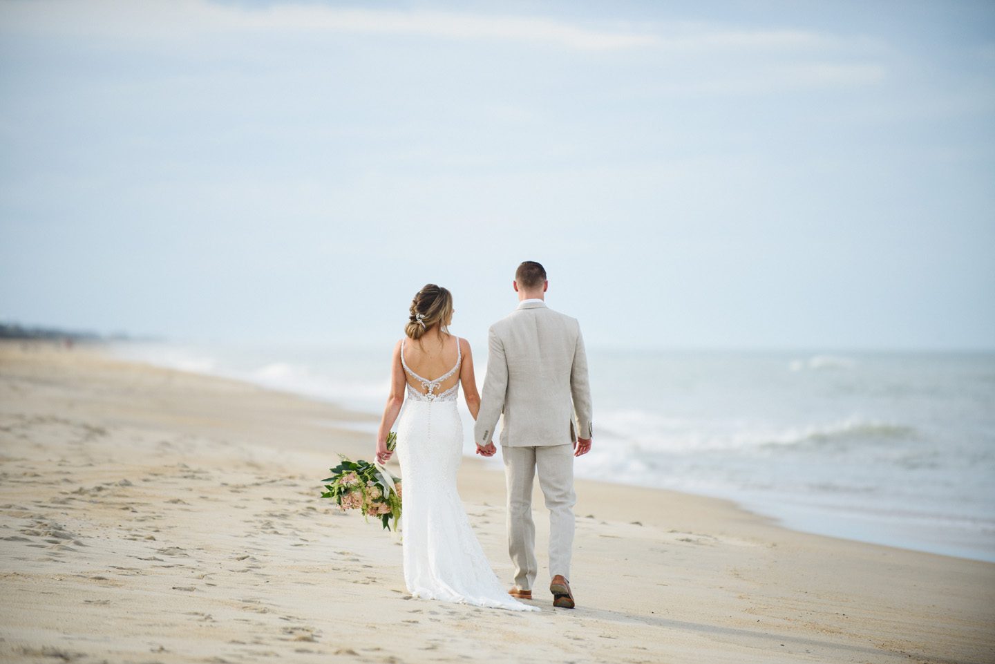 Outer Banks Wedding Photographers Neil GT Photography Palmers Island Beach Elopement Walking Away on Beach