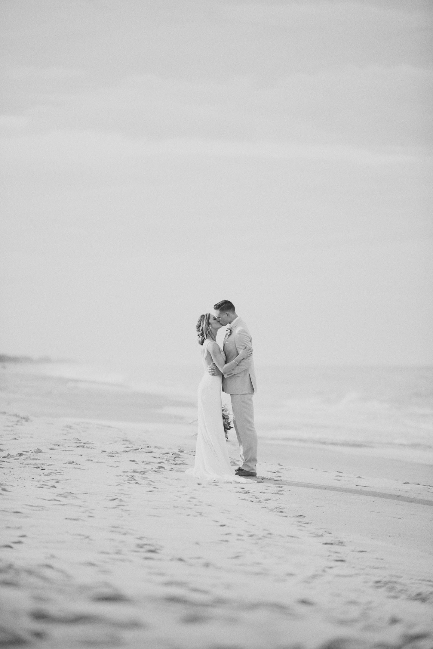 Outer Banks Wedding Photographers Neil GT Photography Palmers Island Beach Elopement Kiss on Beach