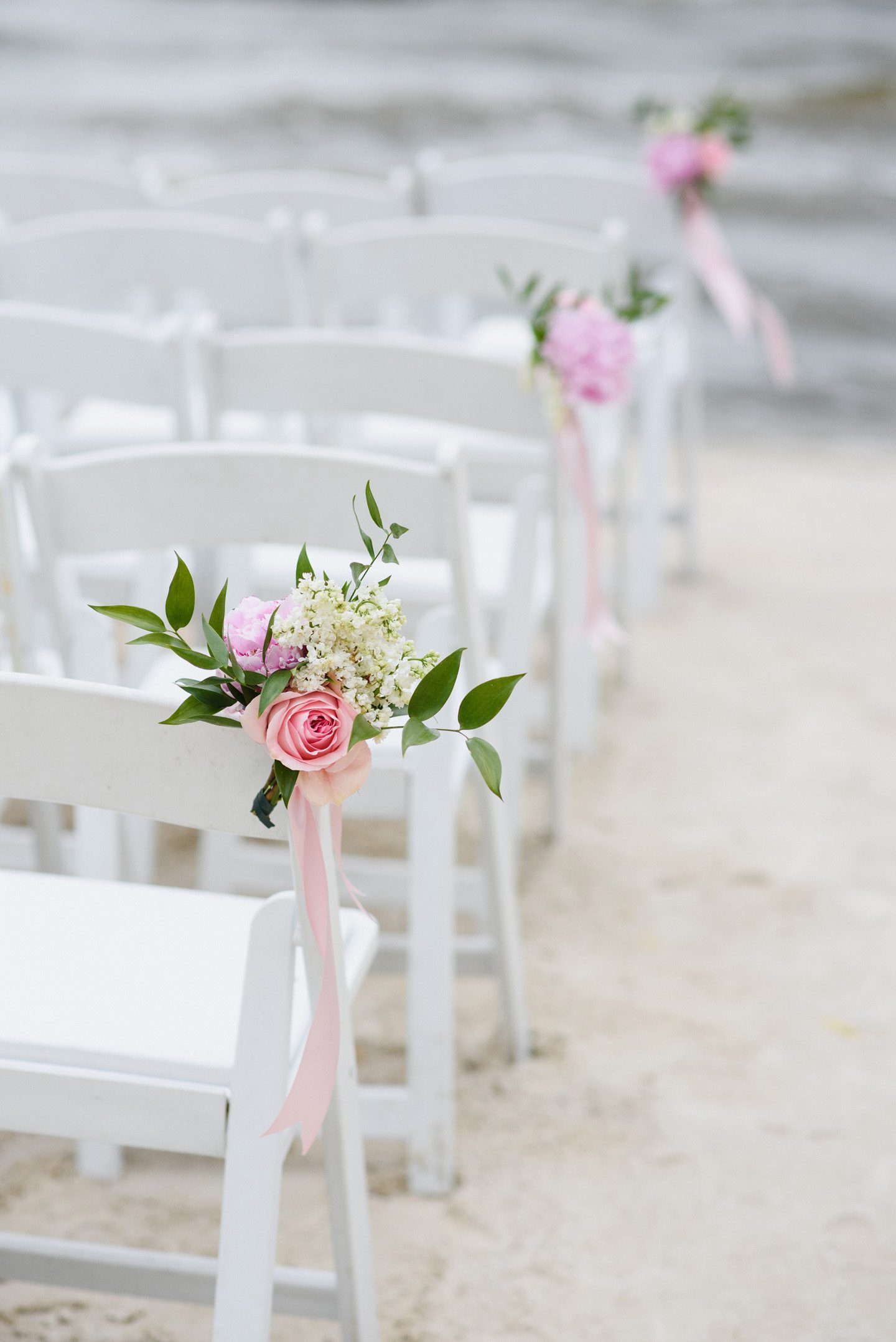 Outer Banks Wedding at the Grade Ritz Palm Photographers Neil GT Photography Ceremony Chairs Decor