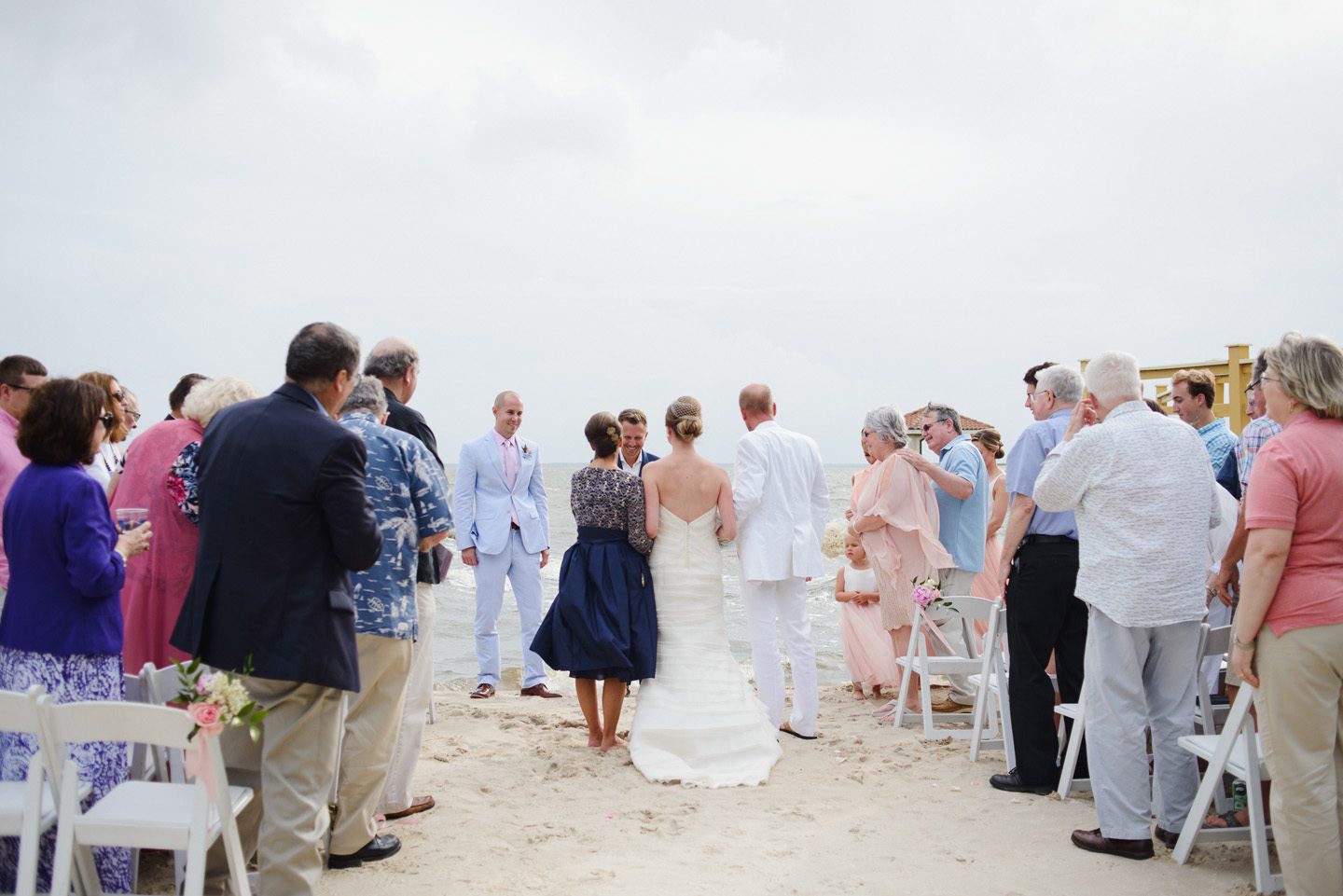Outer Banks Wedding at the Grade Ritz Palm Photographers Neil GT Photography Waterfront Ceremony