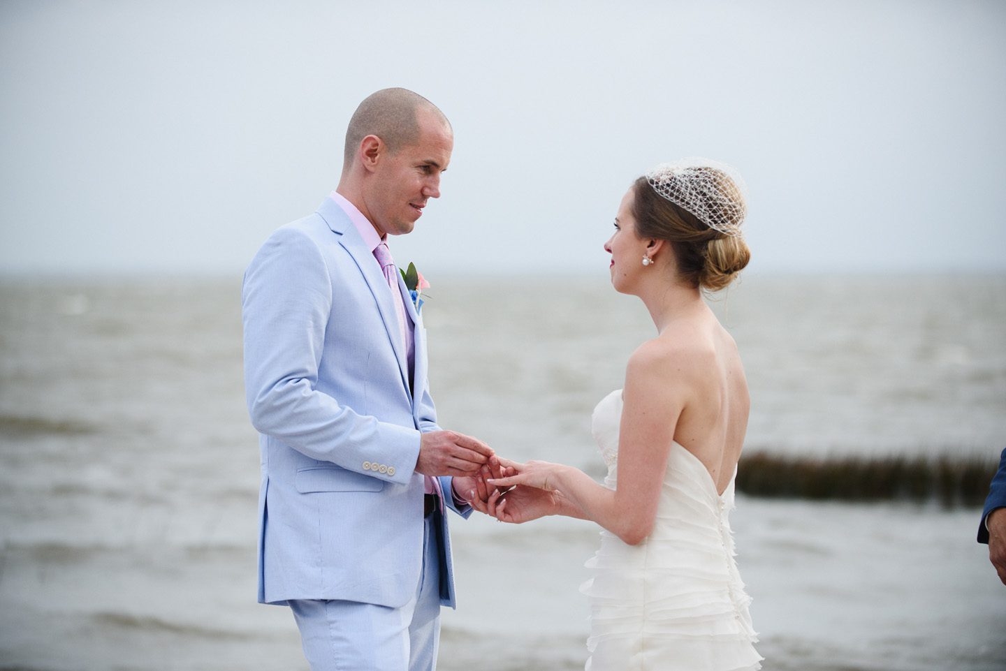 Outer Banks Wedding at the Grade Ritz Palm Photographers Neil GT Photography Ring Exchange