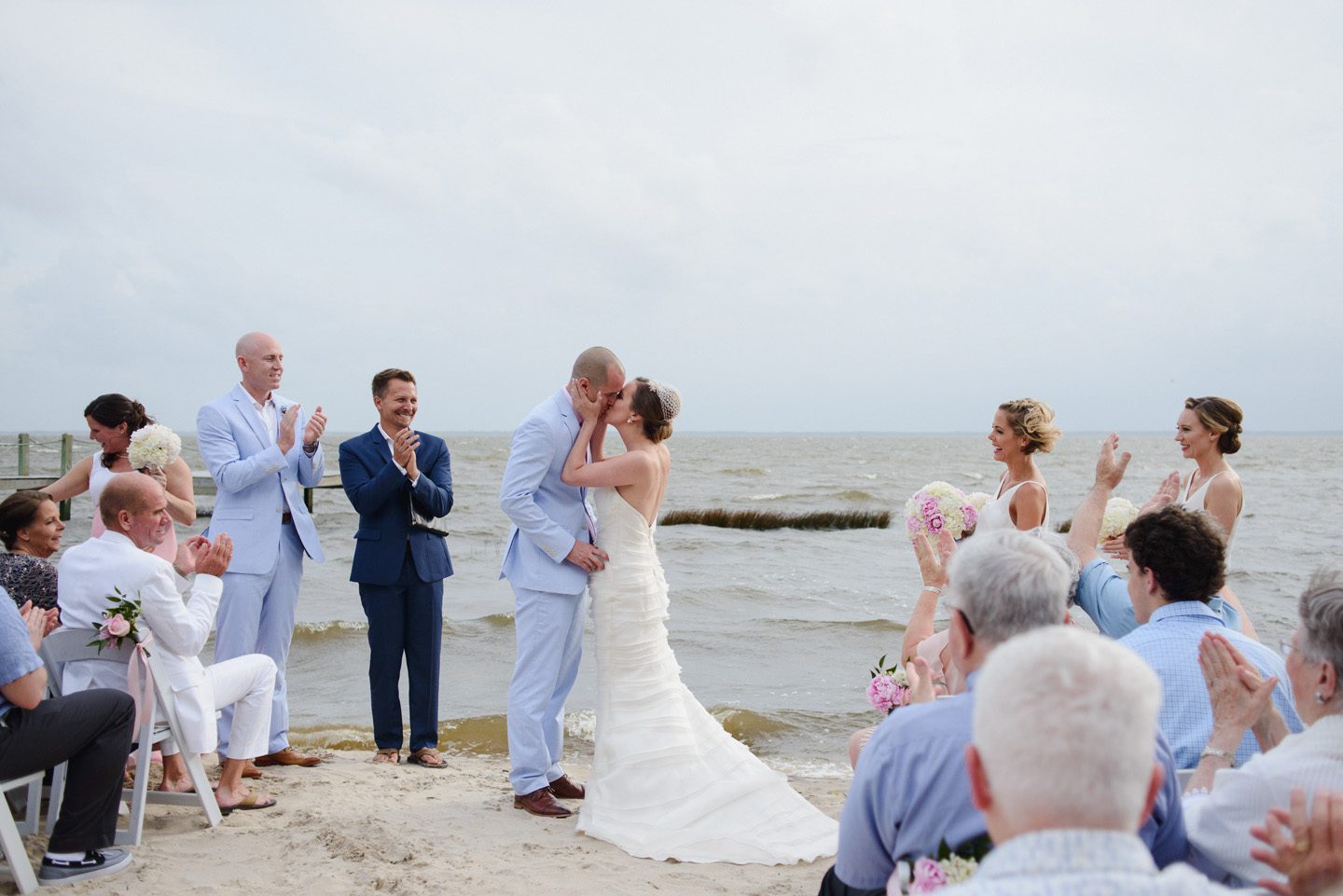 Outer Banks Wedding at the Grade Ritz Palm Photographers Neil GT Photography First Kiss