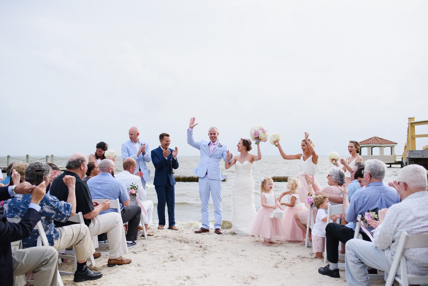 Outer Banks Wedding at the Grade Ritz Palm Photographers Neil GT Photography Officiant Tony Joseph