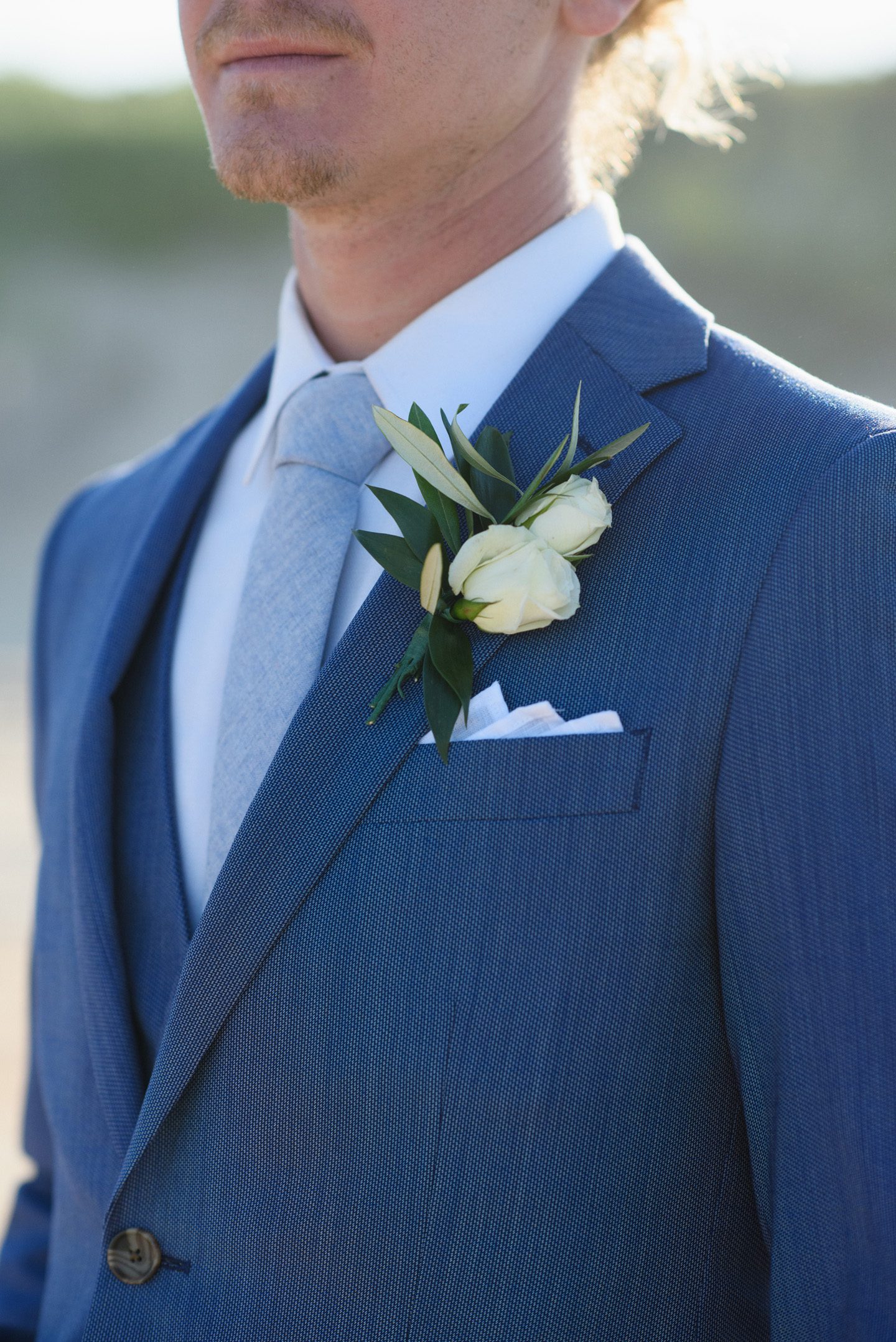 Groom's Floral Photography at Outer Banks Wedding at Sound to Sea Beach Club