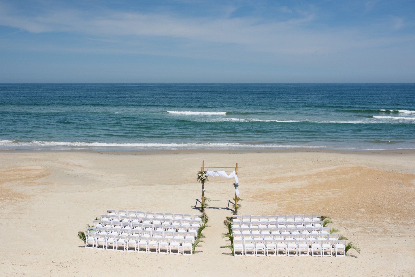Beach Wedding Ceremony Setup Photographer at Outer Banks Wedding at Sound to Sea Beach Club