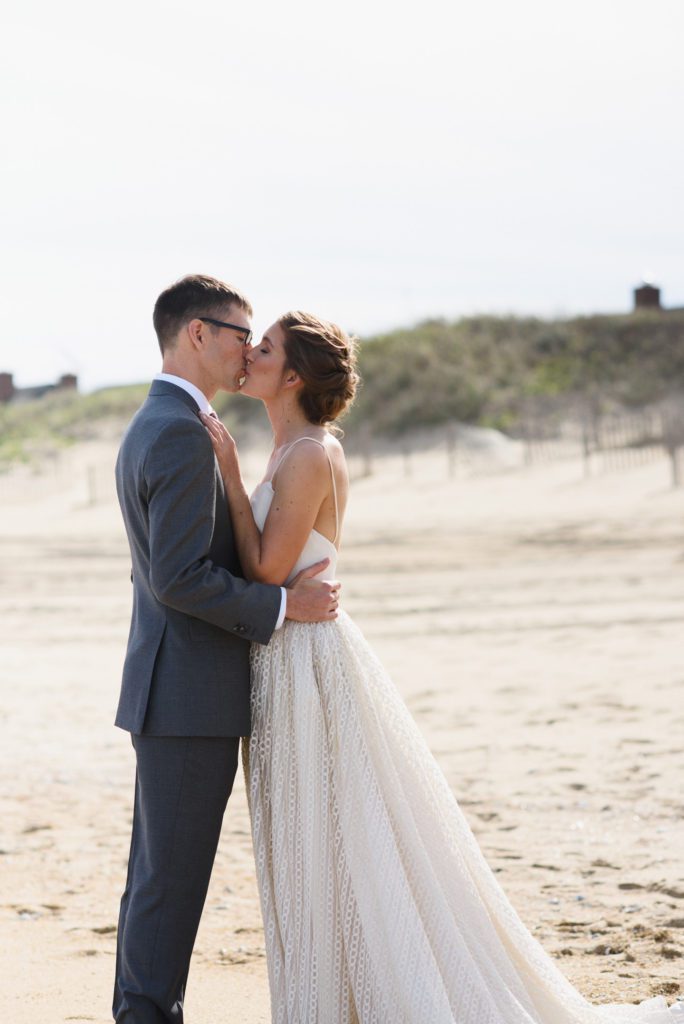Portrait of couple kissing on a Nags Head beach