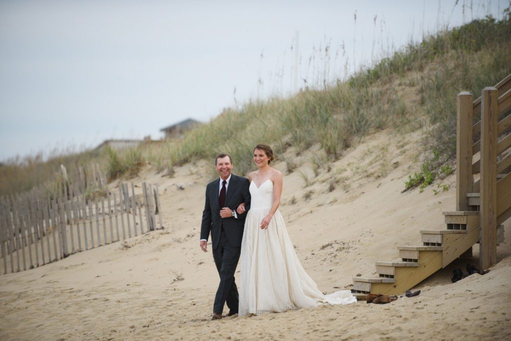 Bride enters ceremony with her father