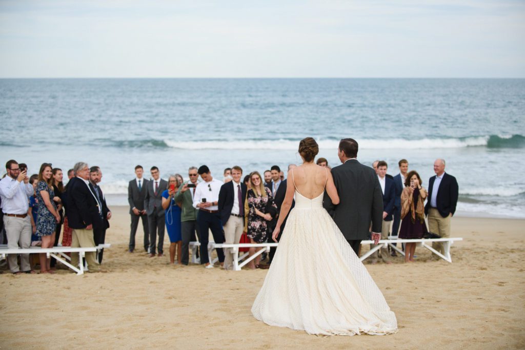 Bride walking down the aisle at Outer Banks wedding ceremony