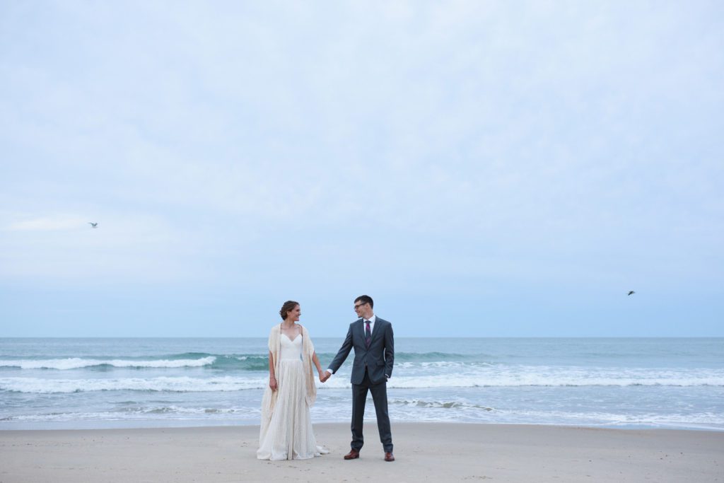 Wedding portraits on the beach at sunset