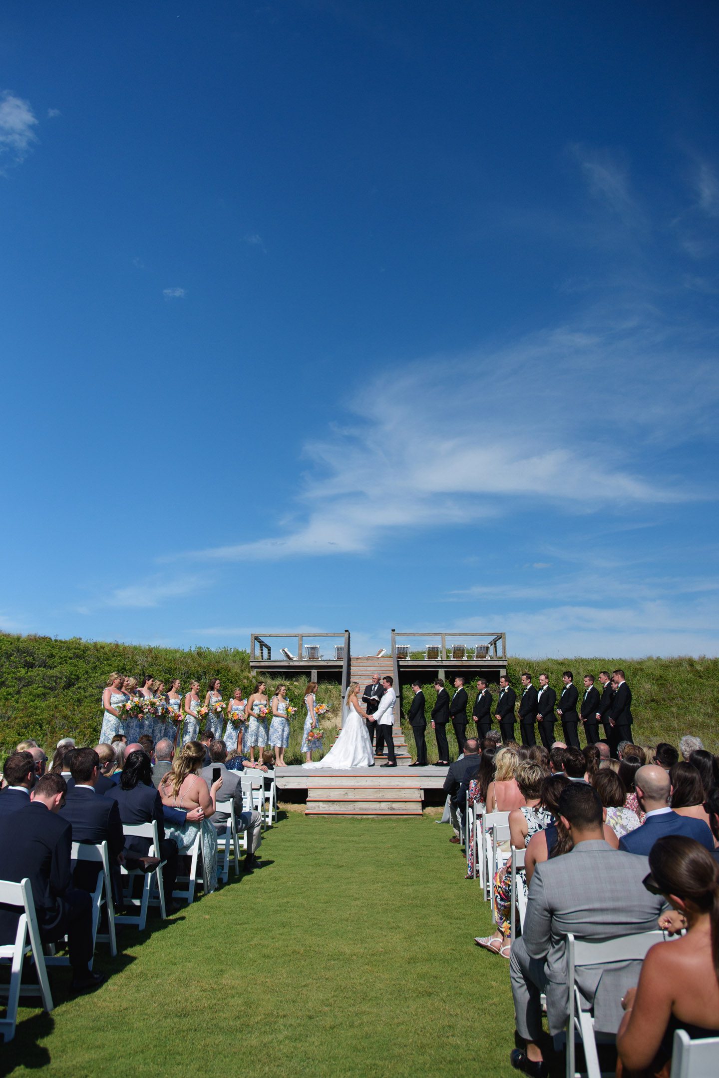 Wedding ceremony on the event lawn at the Sanderling Resort
