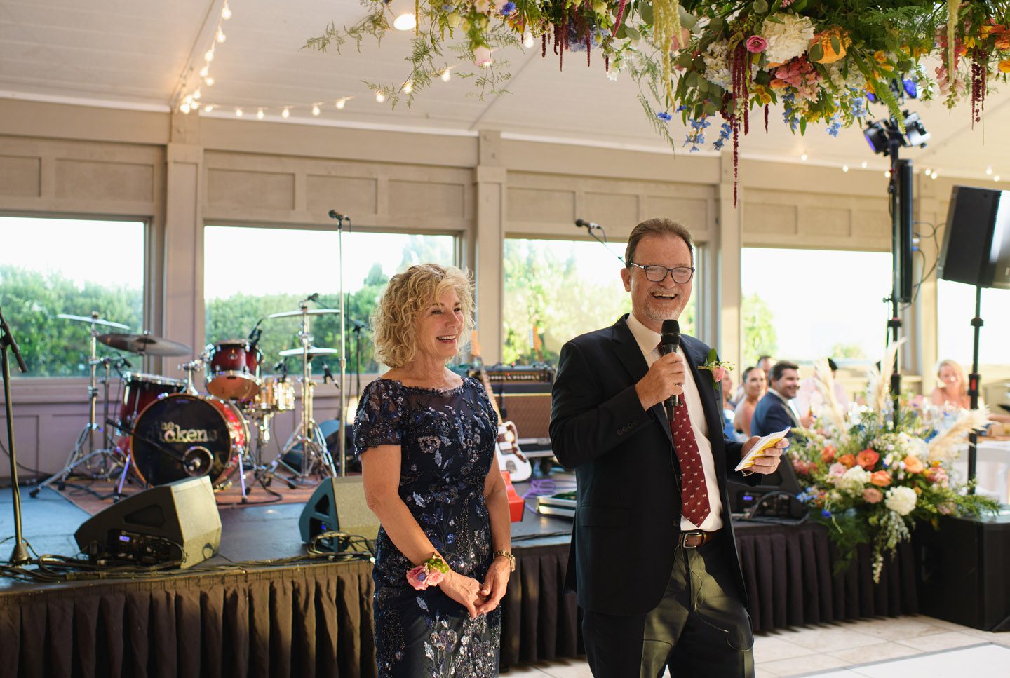 Parents toast the bride and from at a Sanderling wedding