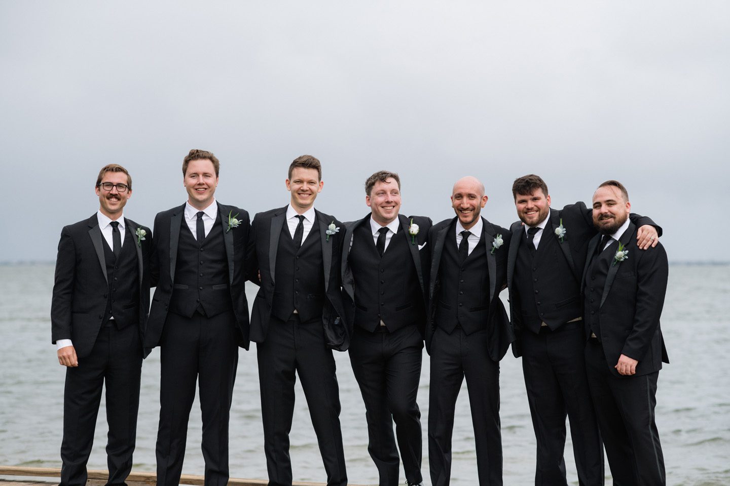 Groom and groomsmen at Festival Park in Manteo